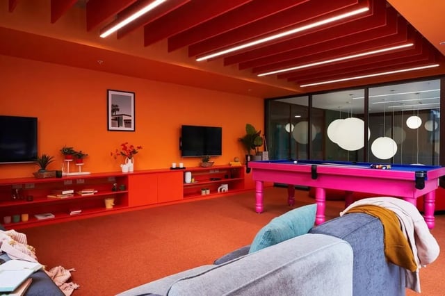 Bright common room with pool table sofas living room at Scape Darlington in Sydney Student Accommodation