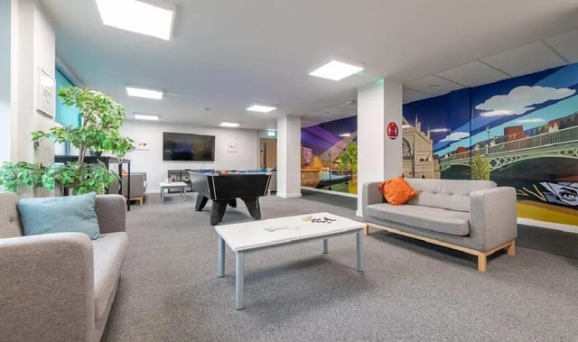 Sofas pool table television plant communal area at Central Living in Exeter Student Accommodation