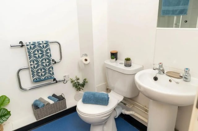 Toilet sink towel rack basket bathroom at Denmark Road in Manchester Student Accommodation