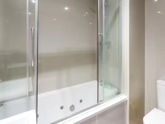 Glass shower screen bathtub and toilet bathroom at 30 Watford Street in Stoke-On-Trent Student Accommodation