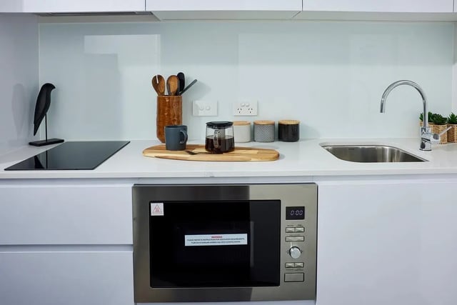Microwave induction hob sink and utensils kitchen at Scape Redfern in Sydney Student Accommodation