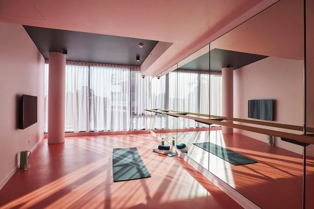 Yoga mats and mirrors workout room at Scape Redfern in Sydney Student Accommodation