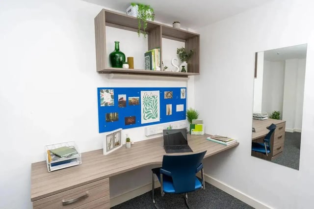 Desk chair bulletin board shelves desk study area at Grafton Street in Manchester Student Accommodation
