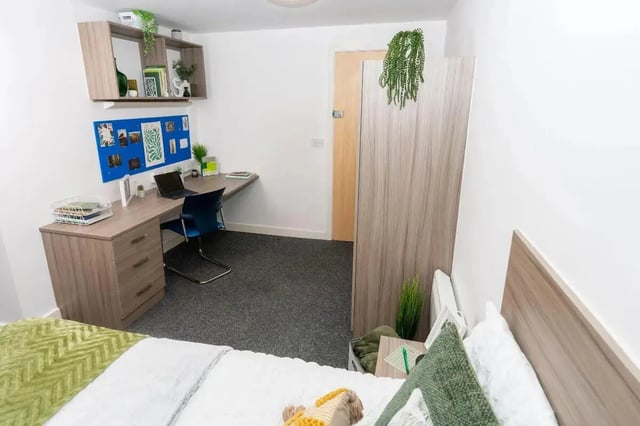 Desk with laptop and chair bedroom at Grafton Street in Manchester Student Accommodation
