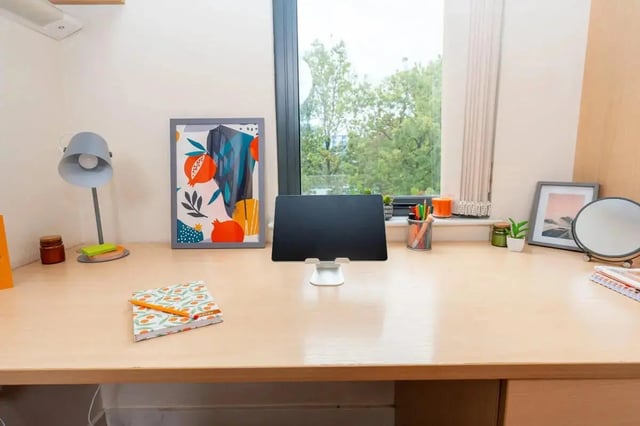 Desk with artwork tablet and lamp Study Area at Grafton Street in Manchester Student Accommodation