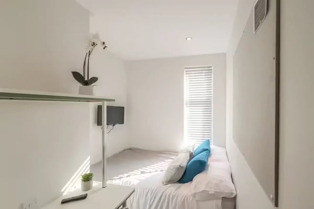 Bed desk plant and TV bedroom at 51 Beresford Street in Stoke-On-Trent Student Accommodation