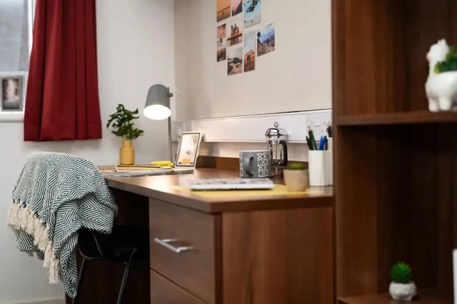 Desk lamp chair blanket photos study desk image at Walker Street in Preston Student Accommodation