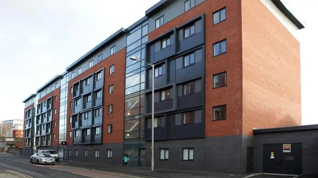 Modern building with brick and dark panels exterior at Walker Street in Preston Student Accommodation
