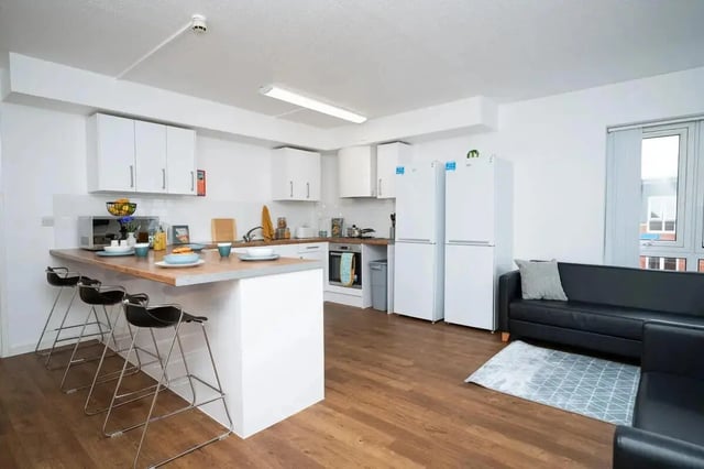 Kitchen area with counter sofas and fridges kitchen at Moor Lane Halls in Preston Student Accommodation