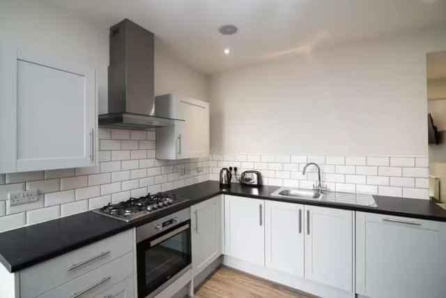 White cabinets stove oven sink toaster kitchen area at 38 Cauldon Road in Stoke-On-Trent Student Accommodation