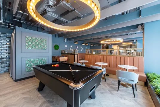 Pool table foosball table lounge area communal room at Luna Hatfield in Hatfield Student Accommodation