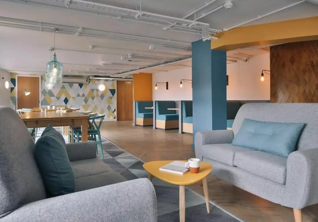 Sofas table and booth seating communal area at iQ Bristol in Bristol Student Accommodation