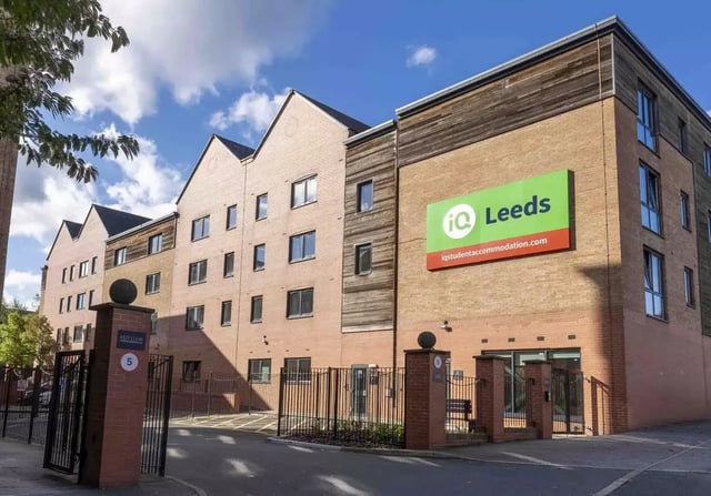iQ Leeds sign brick building with windows exterior at iQ Leeds in Leeds Student Accommodation