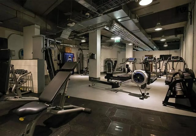 Gym equipment including treadmills rowing machines and weights gym at iQ Shoreditch in London Student Accommodation