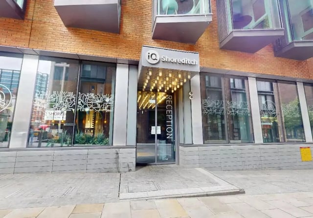 IQ Shoreditch building entrance with reception and plants Exterior at iQ Shoreditch in London Student Accommodation