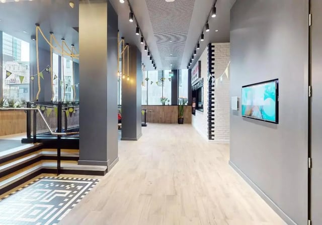 Hallway with rope swings and TV screen interior at iQ Shoreditch in London Student Accommodation
