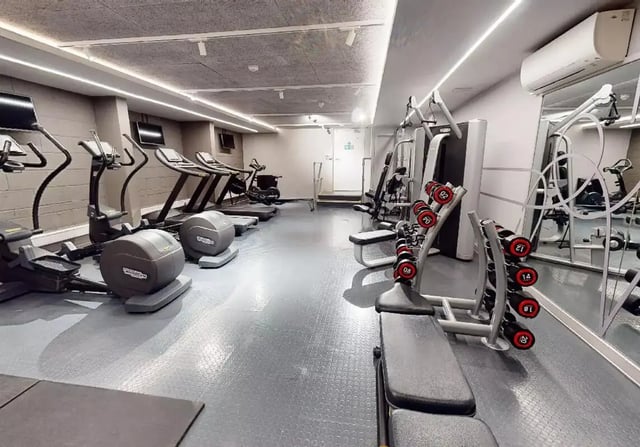 Treadmills ellipticals and dumbbells gym at iQ Kingston in Kingston Upon Thames Student Accommodation