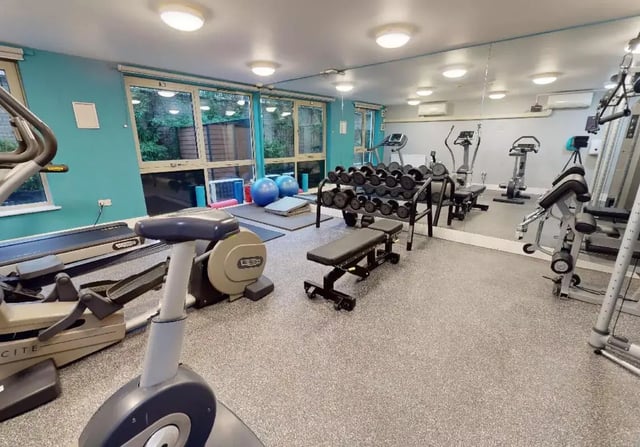Fitness equipment weights bench gym area at iQ Hoxton in London Student Accommodation