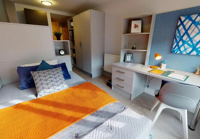 Bed desk chair with artwork Bedroom Study Area at iQ Hoxton in London Student Accommodation