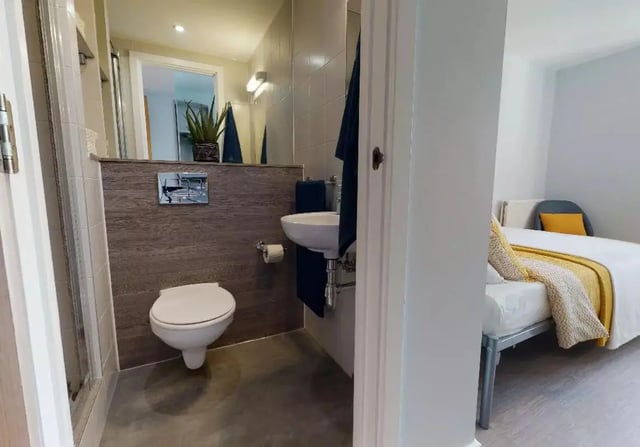 Toilet sink and bed Bedroom and bathroom at iQ Hoxton in London Student Accommodation