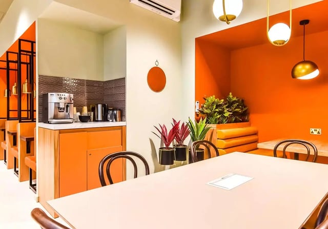Coffee maker plants and table communal area at iQ Bloomsbury in London Student Accommodation