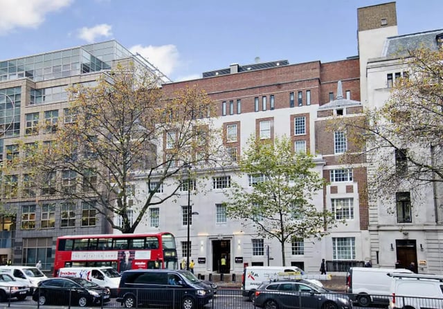 Brick and white building entrance street exterior at iQ Bloomsbury in London Student Accommodation