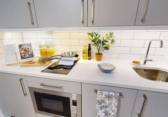 Cooktop jars oven and sink kitchen at iQ Bloomsbury in London Student Accommodation