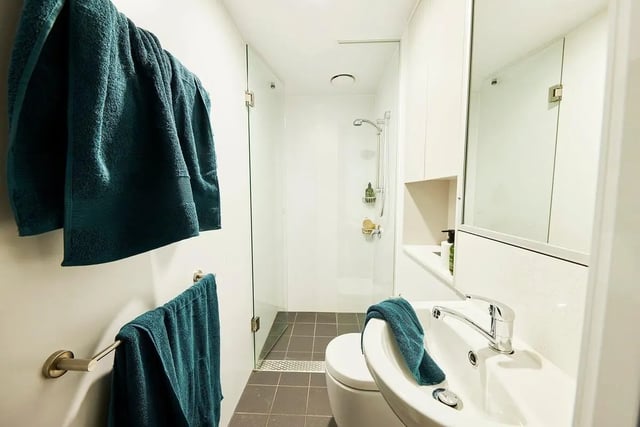 Towels sink toilet shower and mirror bathroom at Scape Darling House in Sydney Student Accommodation