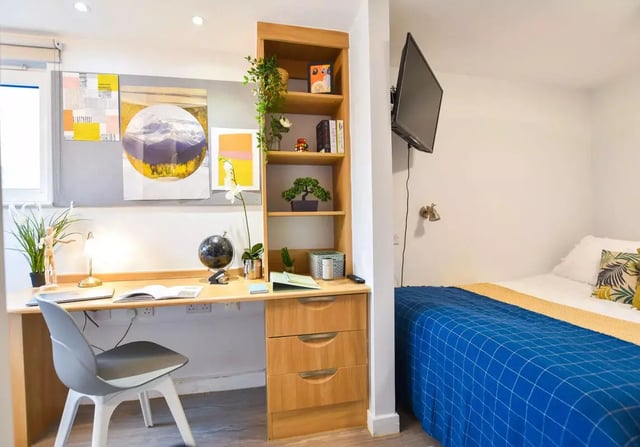 Desk globe chair and bed study area bedroom at iQ Steel in Sheffield Student Accommodation