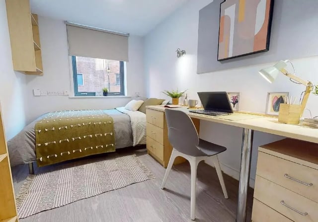 Bed desk laptop chair rug bedroom at iQ Brocco in Sheffield Student Accommodation