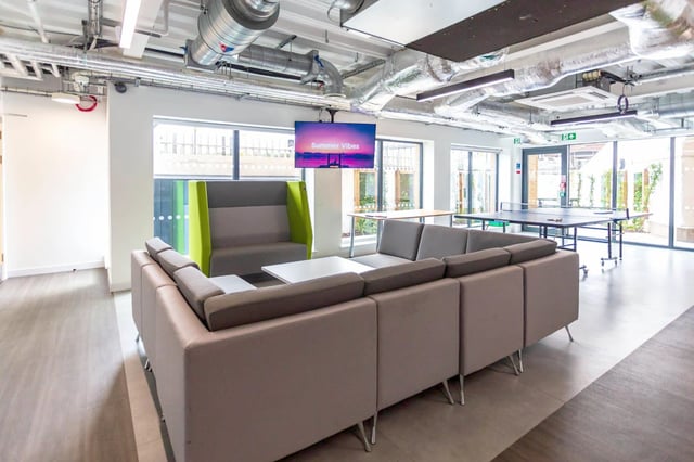 Sofa ping pong table television lounge area at Holden Court in Brighton Student Accommodation