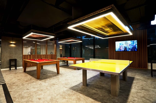 Pool tables ping pong table and TV gaming area at Vita Student Manchester Circle Square in Manchester Student Accommodation