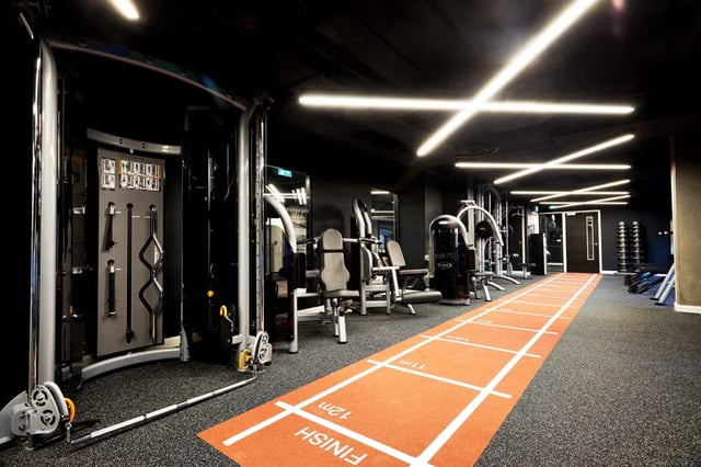 Gym equipment orange track with finish line gym at Vita Student Manchester Circle Square in Manchester Student Accommodation