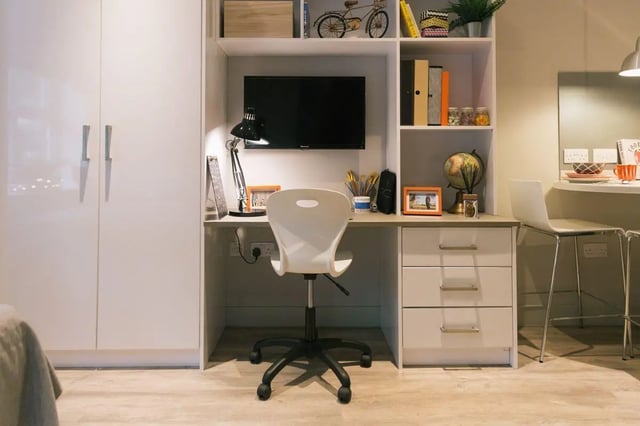 Desk lamp television chair drawers globe study area at Kingsmill Studios in Huddersfield Student Accommodation