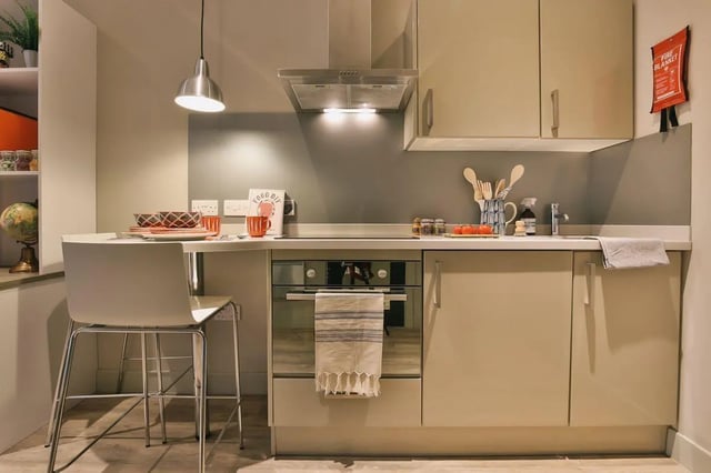 Modern kitchen with seating area and oven kitchen at Kingsmill Studios in Huddersfield Student Accommodation