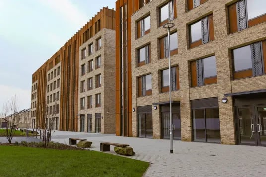 Modern brick building with balconies and windows exterior at Luneside in Lancaster Student Accommodation
