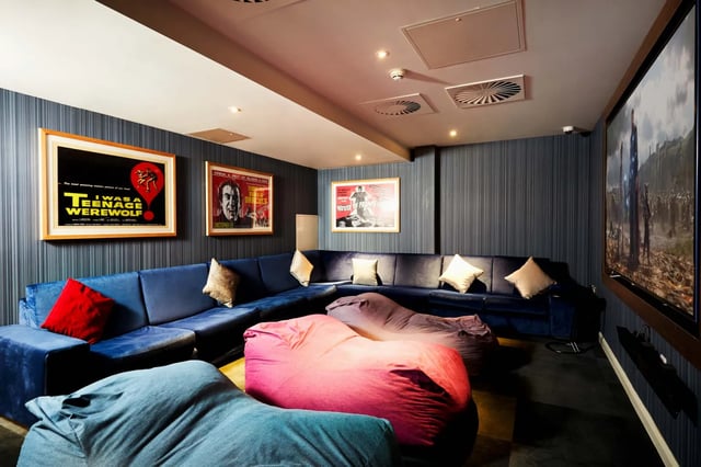 Blue sofa beanbags movie posters large TV living room at Vita Student Newcastle Strawberry Place in Newcastle Upon Tyne Student Accommodation