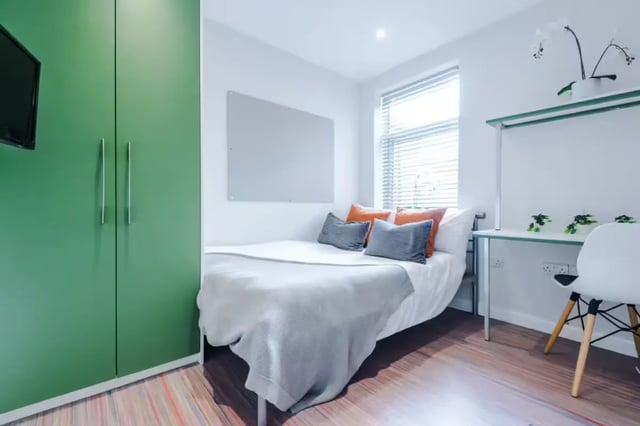 Green wardrobe bed desk chair whiteboard bedroom at 90 Ashford Street in Stoke-On-Trent Student Accommodation