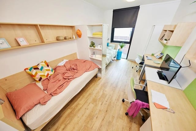 Bed desk and shelves student accommodation bedroom at Scape Cleveland in Sydney Student Accommodation