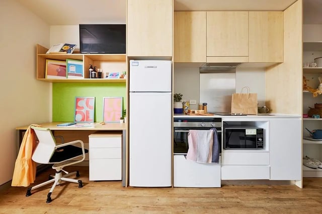 Desk chair fridge oven microwave kitchen living room at Scape Cleveland in Sydney Student Accommodation