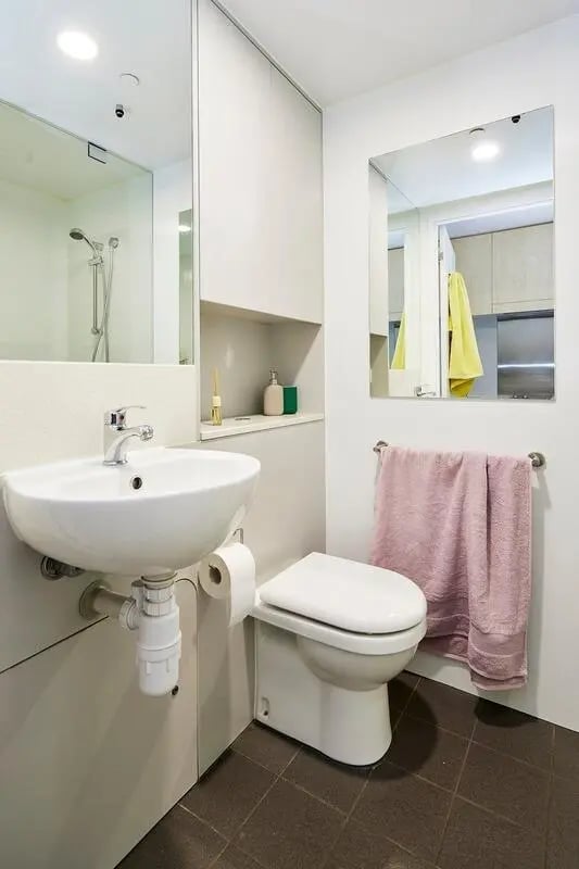 Sink toilet shower mirror towels bathroom at Scape Cleveland in Sydney Student Accommodation