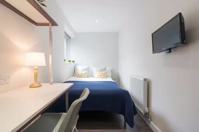 Bed desk lamp television radiator bedroom at 16 Queen Anne Street in Stoke-On-Trent Student Accommodation