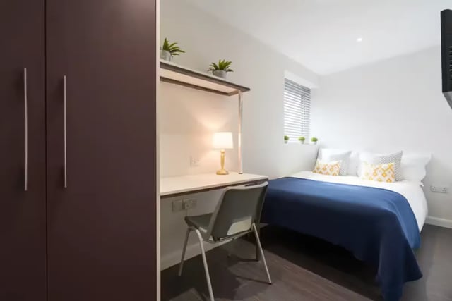Wardrobe desk chair lamp bed bedroom at 16 Queen Anne Street in Stoke-On-Trent Student Accommodation