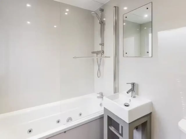 Bathtub sink and mirror Bathroom at 6 Cauldon Road in Stoke-On-Trent Student Accommodation