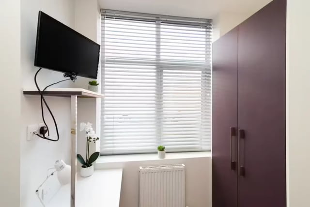 TV shelf blinds plants and wardrobe bedroom at 80 Beresford Street in Stoke-On-Trent Student Accommodation