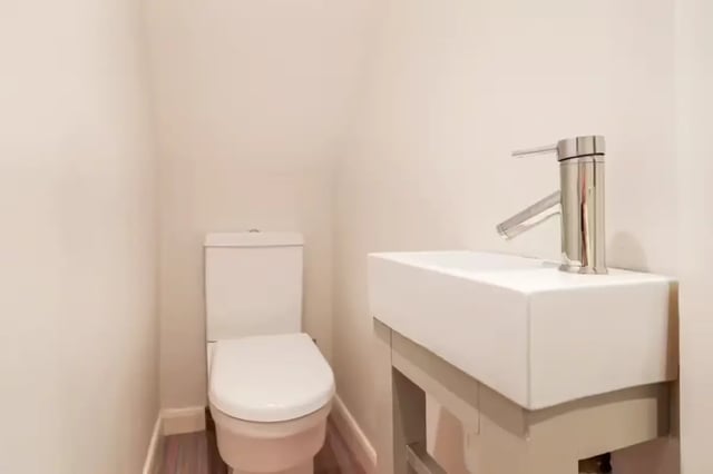 Toilet and sink with modern faucet bathroom at 64 Seaford Street in Stoke-On-Trent Student Accommodation