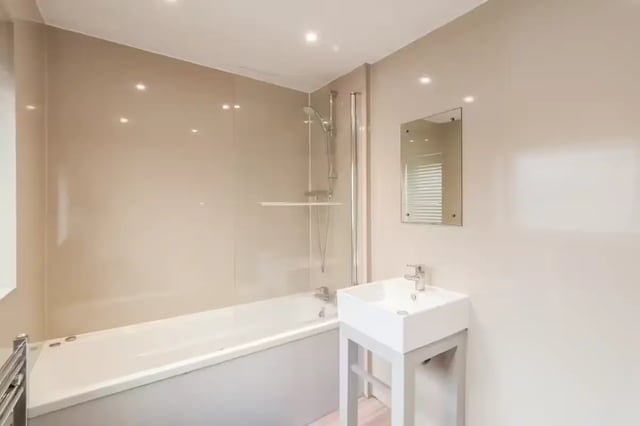 Modern bathroom with sink bathtub and mirror bathroom at 64 Seaford Street in Stoke-On-Trent Student Accommodation