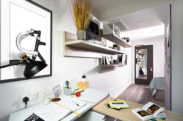 Desk with art and shelves study area at Vita Student Manchester First Street in Manchester Student Accommodation