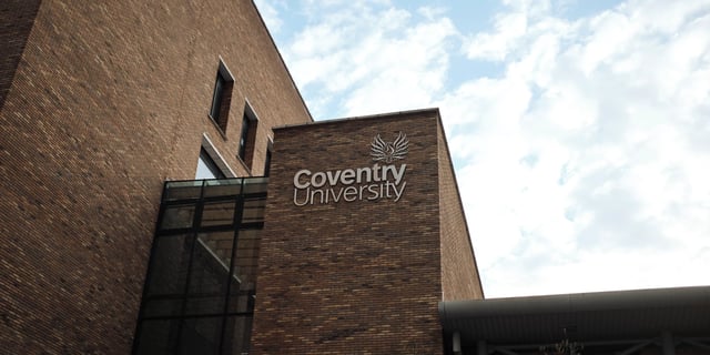 Coventry University signage on brick building exterior at Canvas Coventry Arundel House in Coventry Student Accommodation