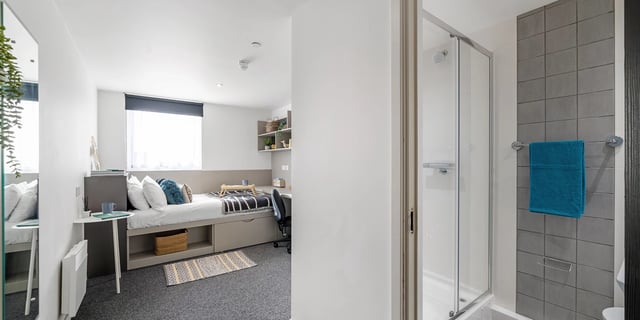 Bed shower and desk area bedroom bathroom at Canvas Coventry City Point in Coventry Student Accommodation
